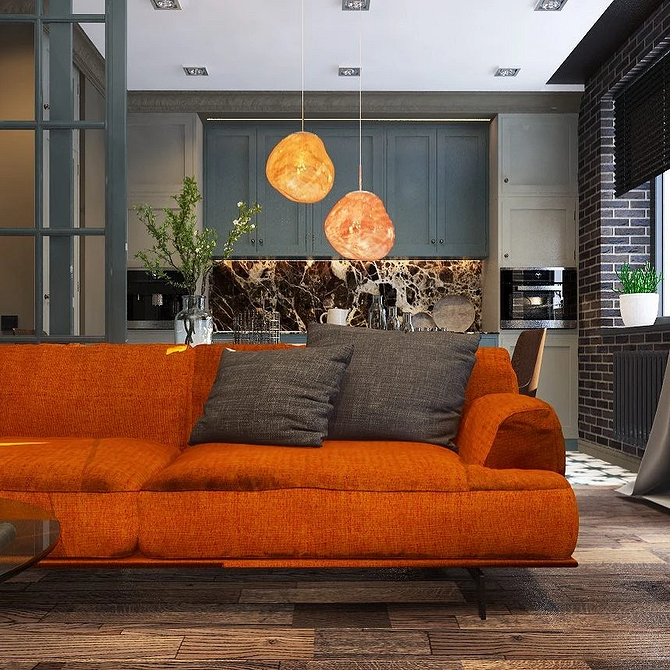 Стильний червоний диван у вітальні з акцентними подушками та килимом, дизайн інтер'єру