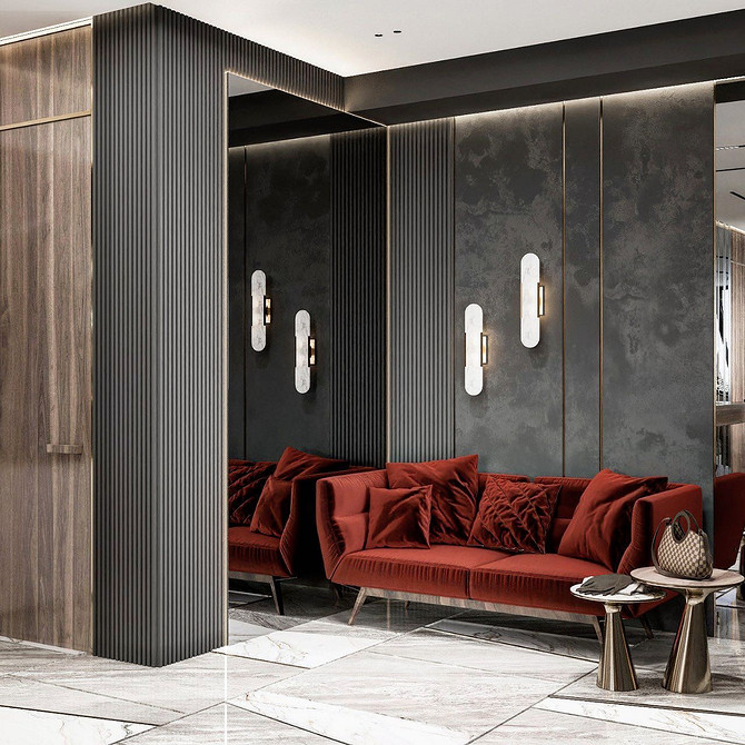 Поєднання червоного дивана з сірими стінами та дерев'яними елементами в інтер'єрі