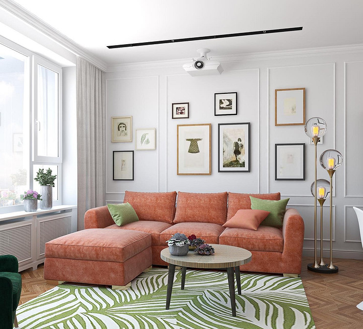 Кухонний червоний диванчик в інтер'єрі кухні з білими шафами та дерев'яною стільницею