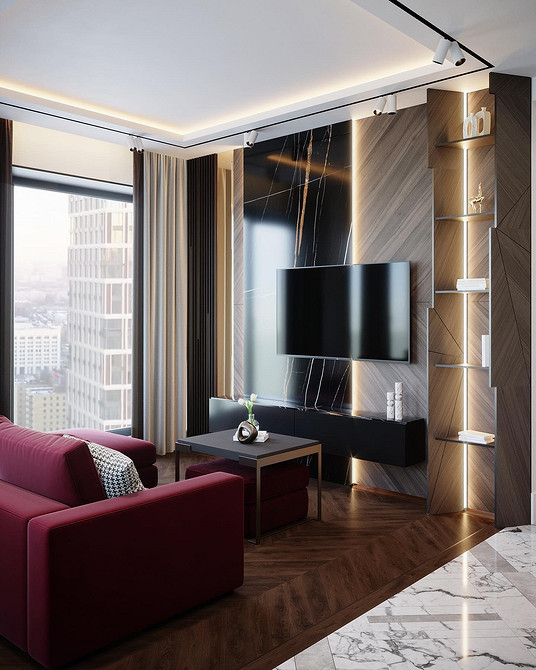 Кімната з червоним диваном і великим вікном, багато природного світла в інтер'єрі