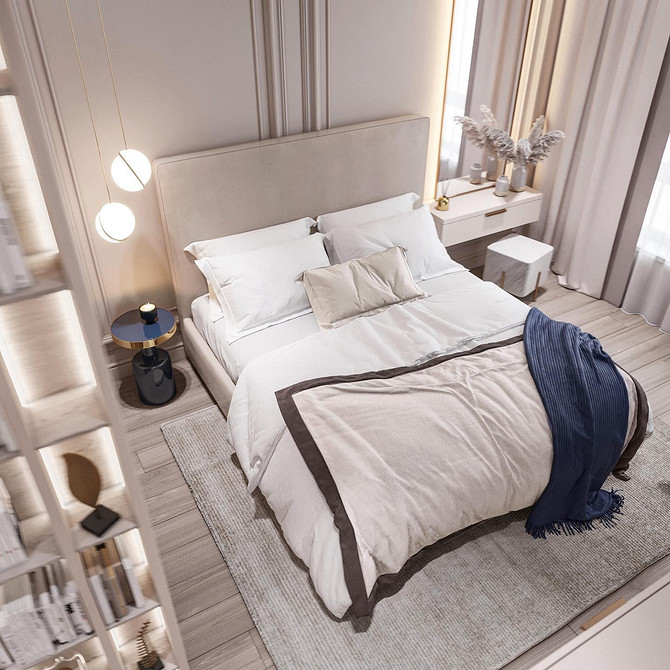 Ліжко з м'якою спинкою з оббивкою з екошкіри в сучасному інтер'єрі спальні.