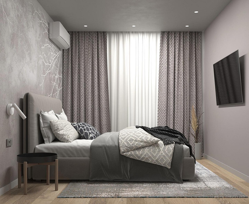 Мінімалістичний дизайн гостьової кімнати з акцентом на м'яке ліжко