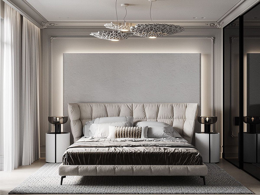 М'яка спинка ліжка з оббивкою з тканини з геометричним візерунком в дитячій кімнаті.