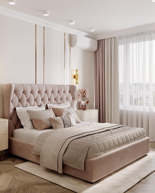 Інтер'єр гостьової кімнати з двоспальним ліжком та м'яким акцентним узголів'ям