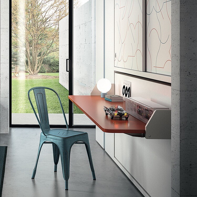 Ліжко-трансформер, що складається в шафу, - чудовий спосіб створити затишний простір в квартирі.