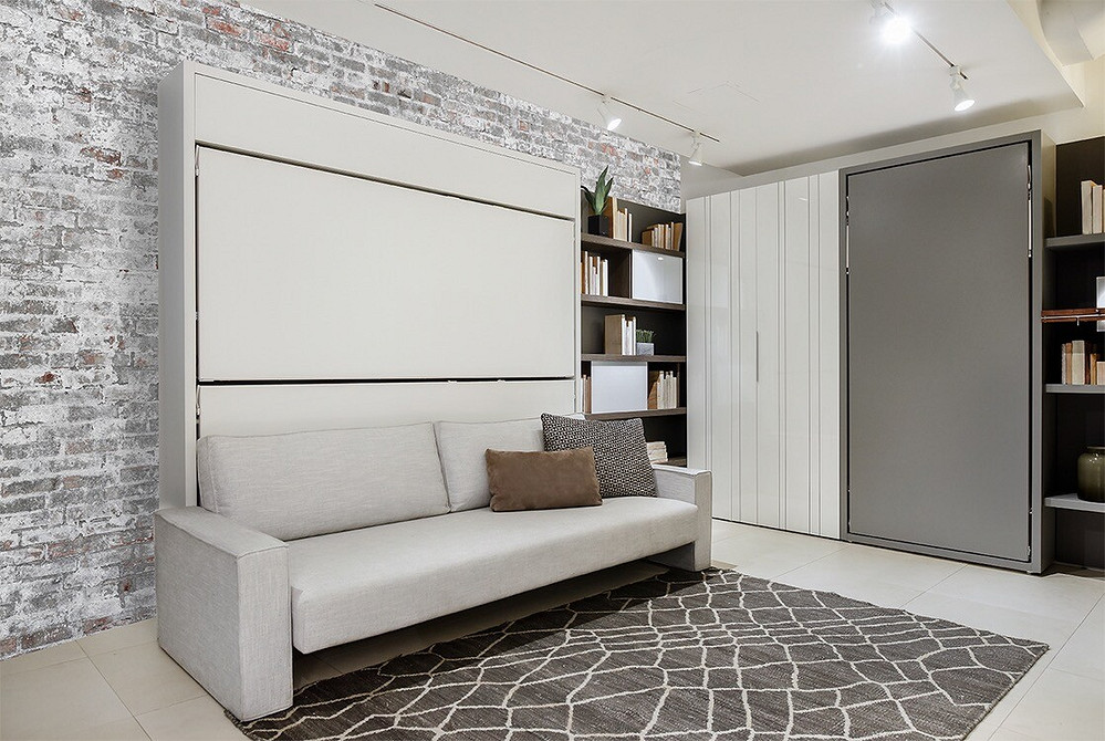 Ліжко-трансформер, вбудоване в шафу, ідеально для економії простору в малогабаритній квартирі.