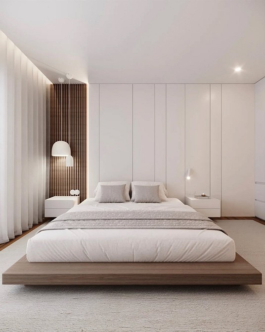 Модний дизайн спальні 2025: ліжко з акцентом на форму та мінімалістичний простір.