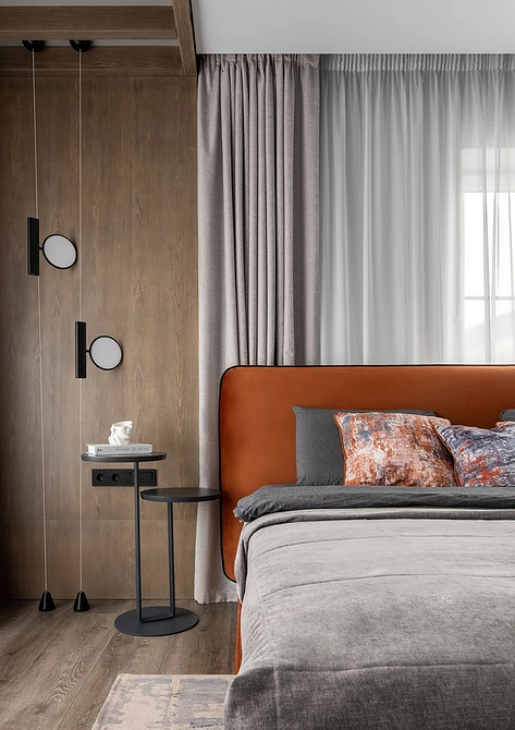 Сучасний інтер'єр спальні 2025: акцент на ліжко та мінімалізм в деталях.