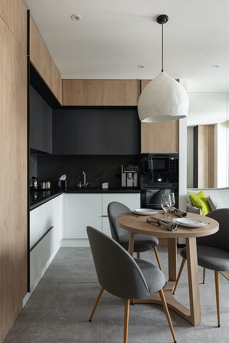 Круглий обідній стіл в інтер'єрі: вибір форми та дизайн для затишної кухні.