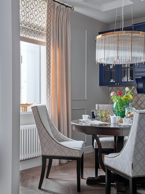 Круглий обідній стіл в інтер'єрі сучасної кухні, поради щодо вибору