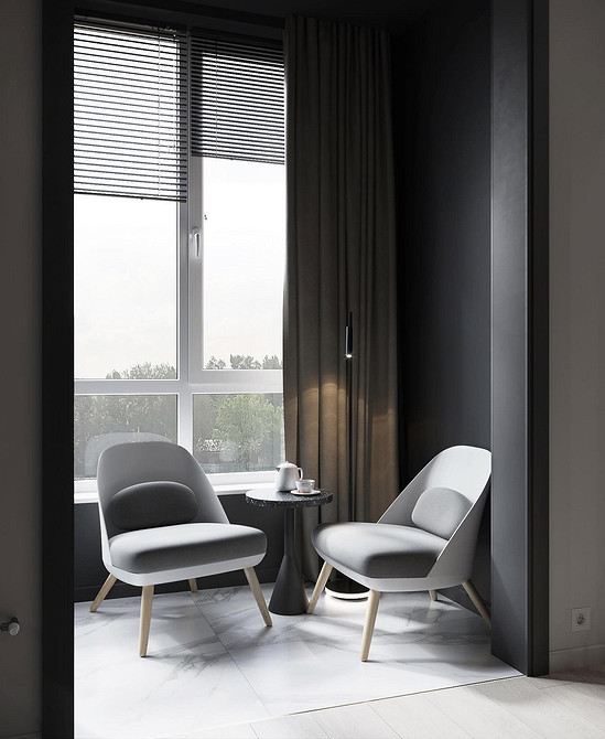 Вітальня з круглим столом, з'єднана з кухнею, зручне планування простору