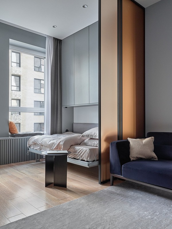 Багатофункціональні меблі для дому: стильний диван-трансформер для невеликої вітальні.