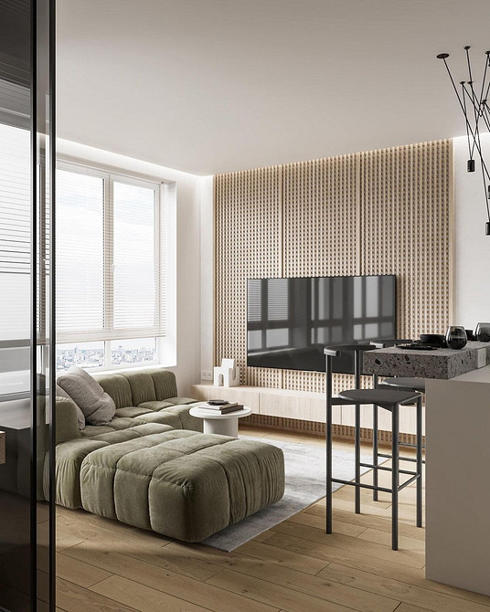 Великий модульний диван у вітальні: простір для відпочинку та розваг