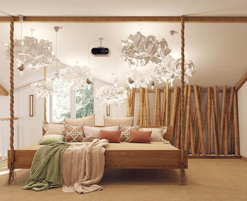Сучасний дизайн спальні з підвісним ліжком, що створює відчуття легкості та простору.