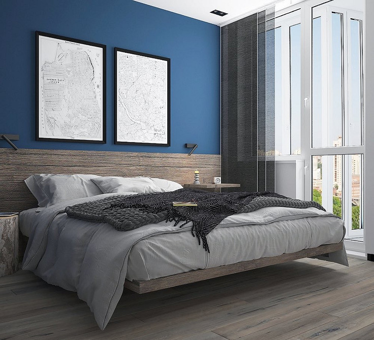 Стильна спальня з парячим ліжком, темними стінами і яскравою підсвіткою