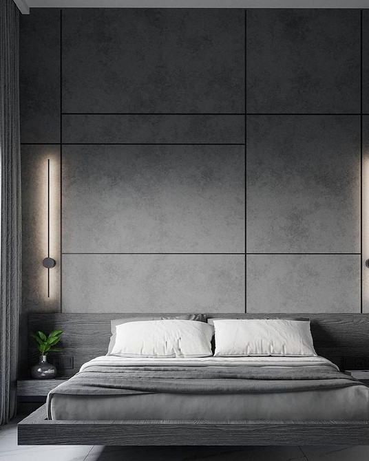 Інтер'єр спальні з великим парячим ліжком і приліжковими тумбочками, що також парять