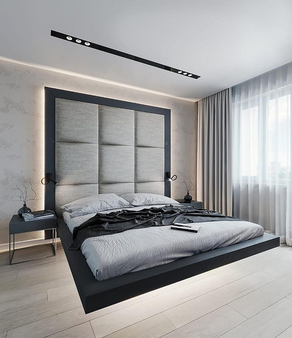 Стильне ліжко, що літає, в мінімалістичній спальні з акцентною стіною.