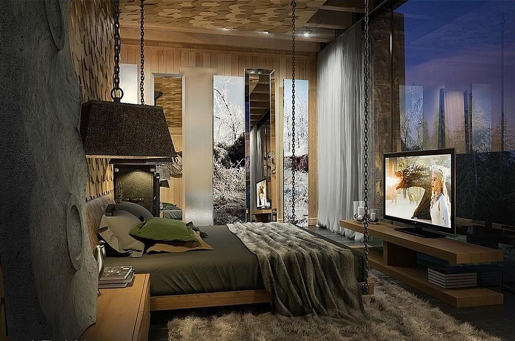 Затишна спальня з підвісним ліжком, оформлена в теплих тонах та з м'яким освітленням.