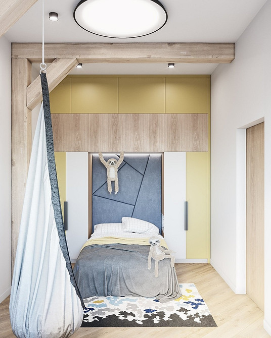 Підвісне крісло кокон з м'якими подушками у світлій вітальні