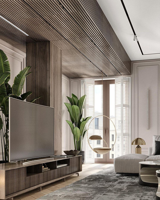 Біле підвісне крісло в світлому інтер'єрі, елегантне рішення для зони відпочинку.