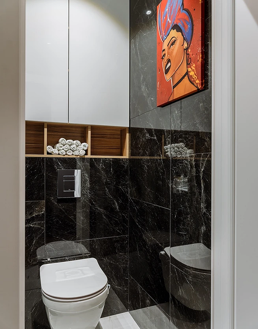 Книжкові полиці від підлоги до стелі в дизайні сучасної бібліотеки