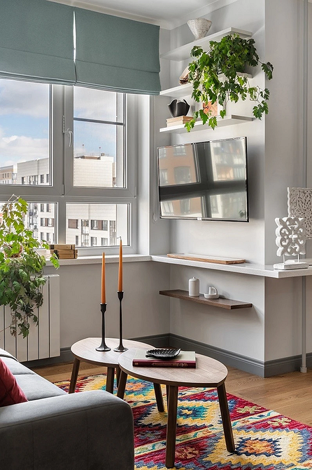 Дизайн інтер'єру з настінними полицями: декоративні елементи на полицях