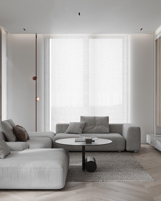 Диван з яскравими подушками, сучасний дизайн вітальні, тренди 2024.