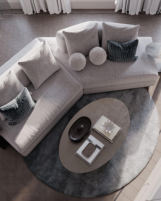 Дизайн інтер'єру вітальні з великим зручним диваном та журнальним столиком