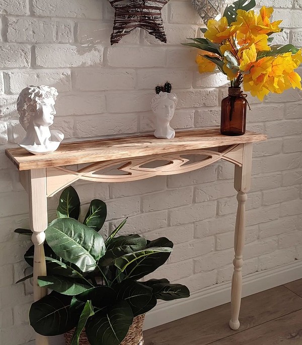 Дизайн інтер'єру: оригінальні меблі ручної роботи, що підкреслюють індивідуальність простору.