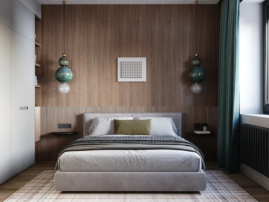 Дизайн спальні з сірим ліжком, пледом та декоративними подушками для комфорту.