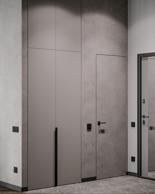 Світла вітальня з сірим диваном, килимом та декоративними рослинами, що додають свіжості інтер'єру.