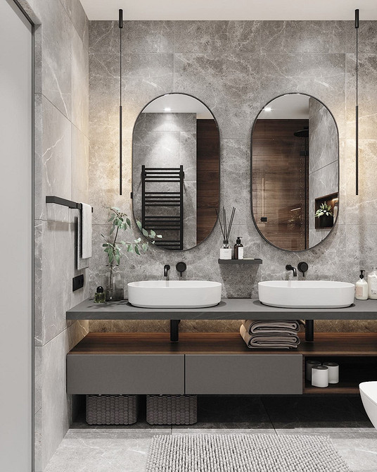 Інтер'єр ванної кімнати з сірими меблями та акцентами дерева.