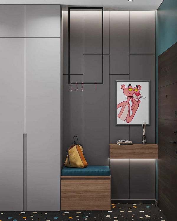 Дизайн прихожої в сірих кольорах з функціональними меблями та дзеркалом для візуального збільшення простору.