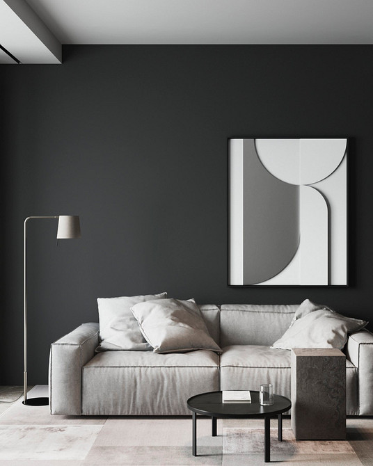 Сірий велюровий диван в інтер'єрі з рожевими та золотими акцентами для елегантності