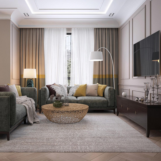 Текстиль для дивану: подушки з геометричними візерунками на сірому дивані.