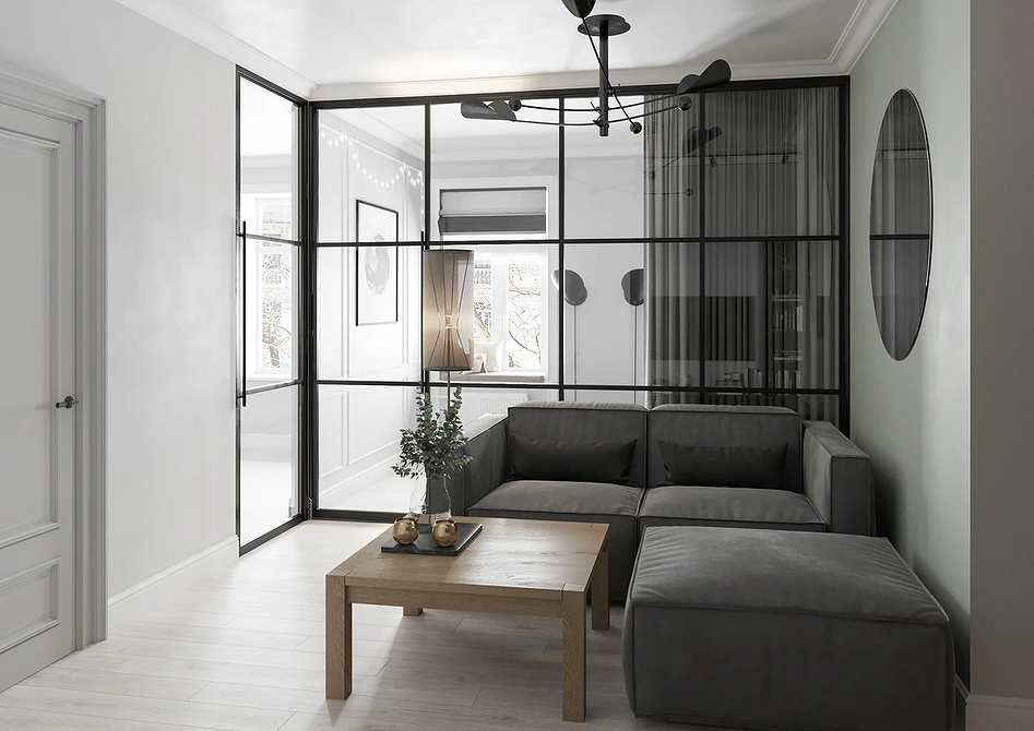 Сірий диван з високою спинкою для комфортного відпочинку в вітальні