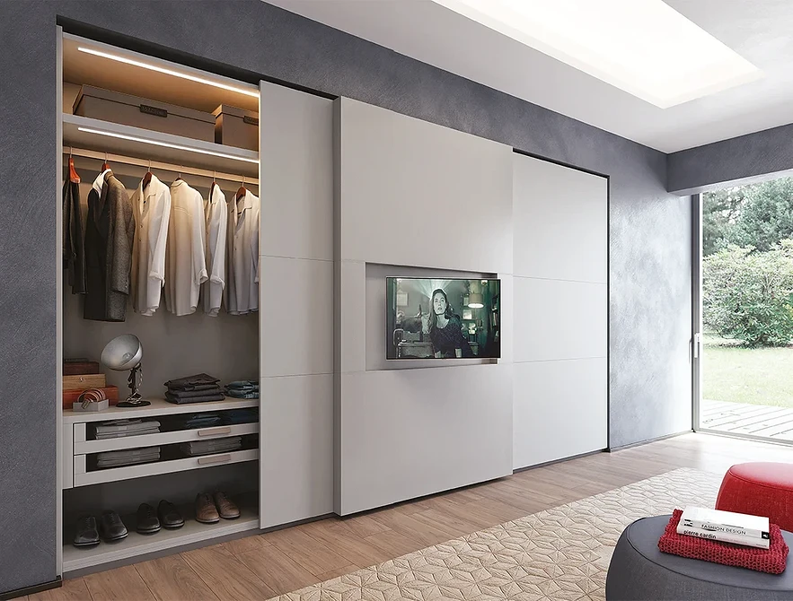 Мінімалістична тумба під телевізор в світлій вітальні з дерев'яними акцентами.