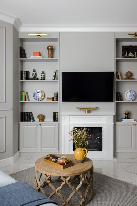 Організація простору у вітальні з телевізором: модульні системи та зберігання