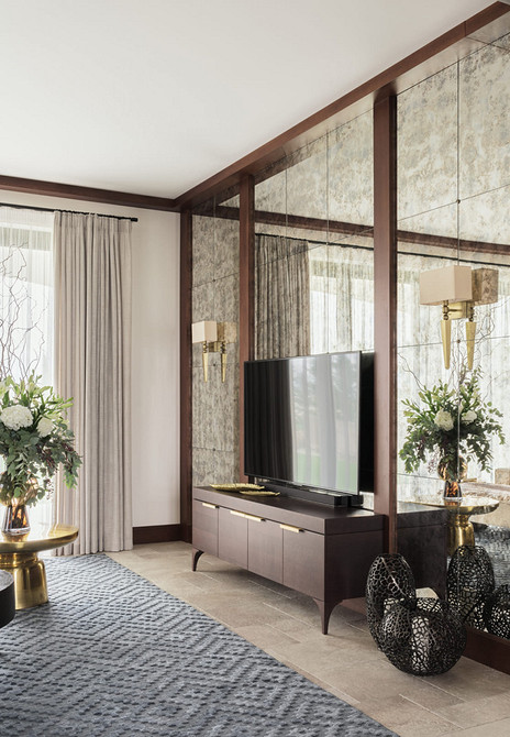 Тумба під телевізор в сірих тонах з лаконічним дизайном для сучасної вітальні.