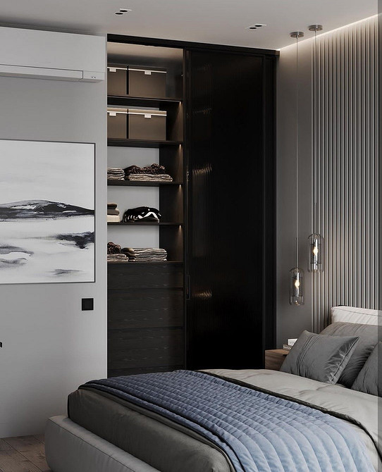 Стильна кутова шафа-купе в спальні, що дозволяє ефективно використовувати кутовий простір.