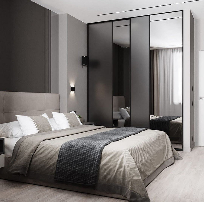 Світла шафа-купе в мінімалістичній спальні: функціональність та лаконічний дизайн.