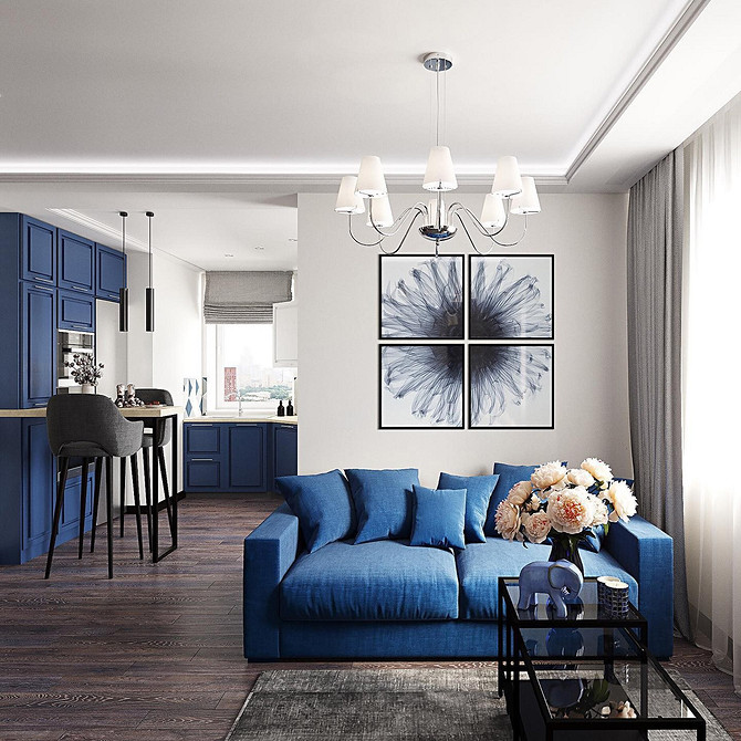 Дизайн інтер'єру з синім диваном: вдале поєднання кольорів та сучасних меблів.