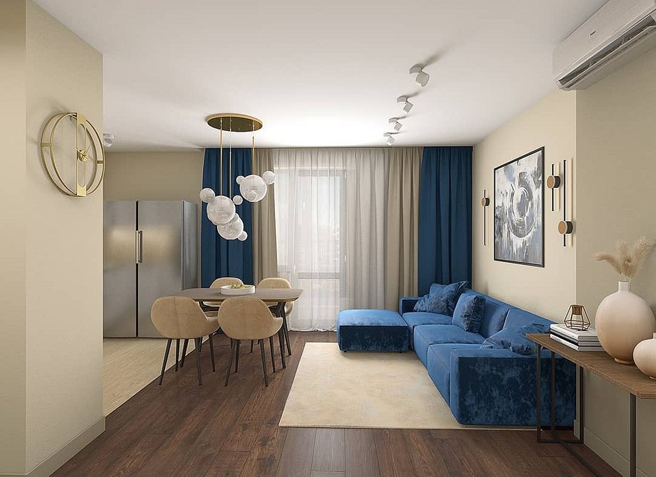 Інтер'єр з синім диваном, журнальним столиком та стильною лампою