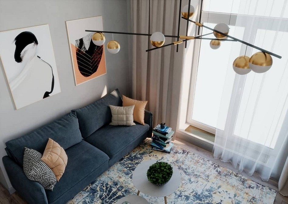 Синій диван в мінімалістичному інтер'єрі, поєднання з білими стінами та дерев'яною підлогою