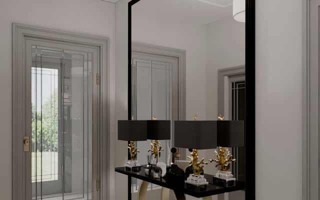 Світлий неокласичний інтер'єр кухні-вітальні в заміському будинку з великими вікнами.