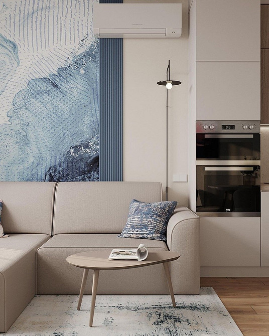 Дизайн кухні з кутовим диваном та дерев'яним столом, тепла атмосфера та сімейні обіди.