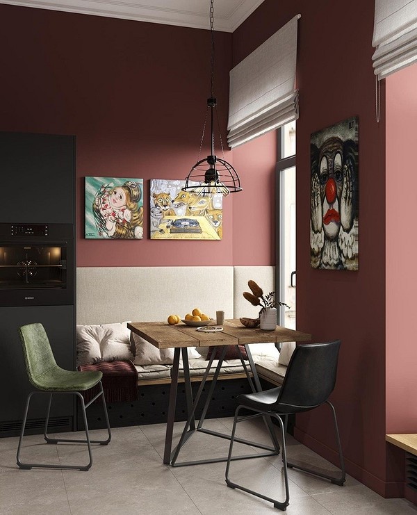 Невеликий кухонний куточок з кутовим диваном біля вікна, ідеальне місце для сніданку.