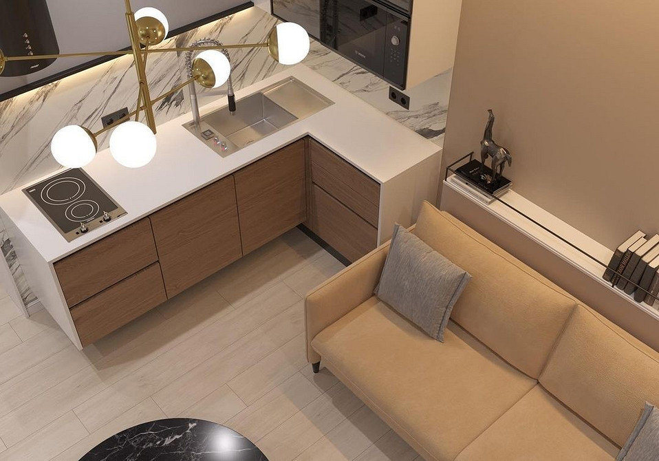 Невелика кухня з кутовим диваном, оптимальне використання простору та зручність.