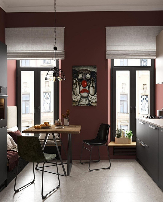 Дизайн кухні з кутовим диваном біля вікна для максимального природного освітлення.