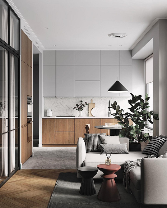 Кутовий диван на кухні з великою кількістю подушок для максимального комфорту